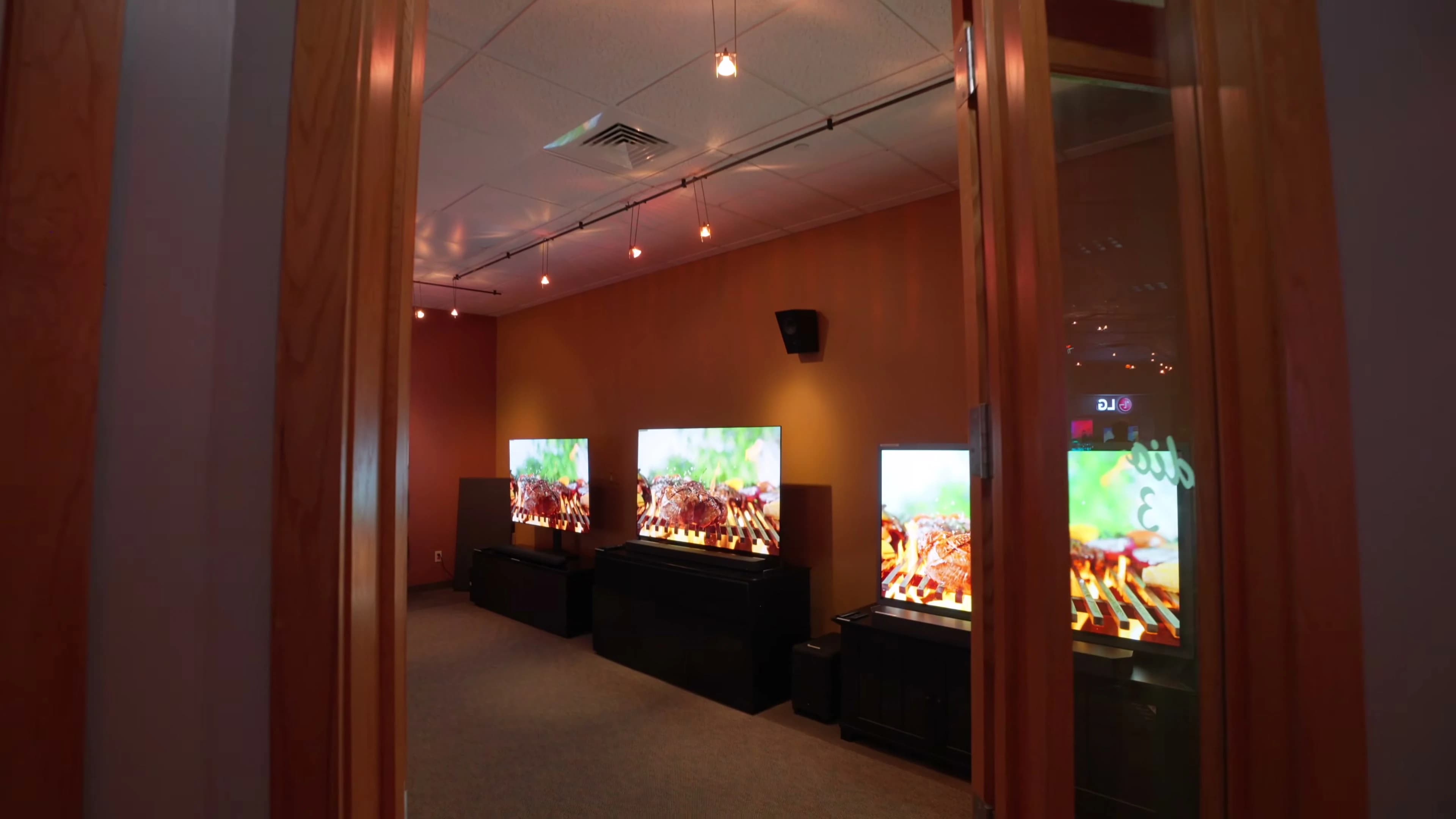 Side-by-side large display comparison room at Bjorn’s San Antonio showroom