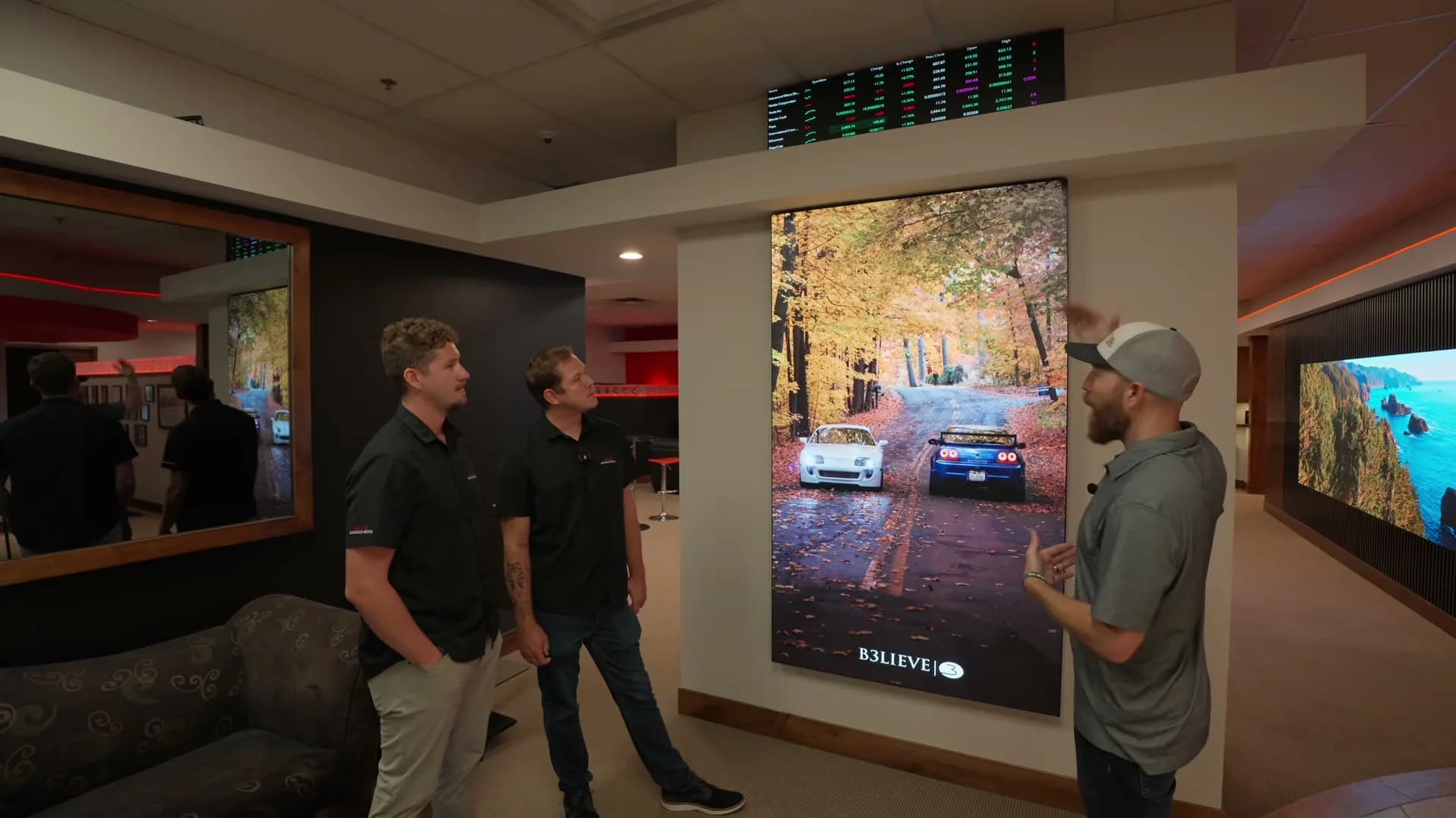 Skyler and the Milow team touring the portrait MicroLED and showroom floor