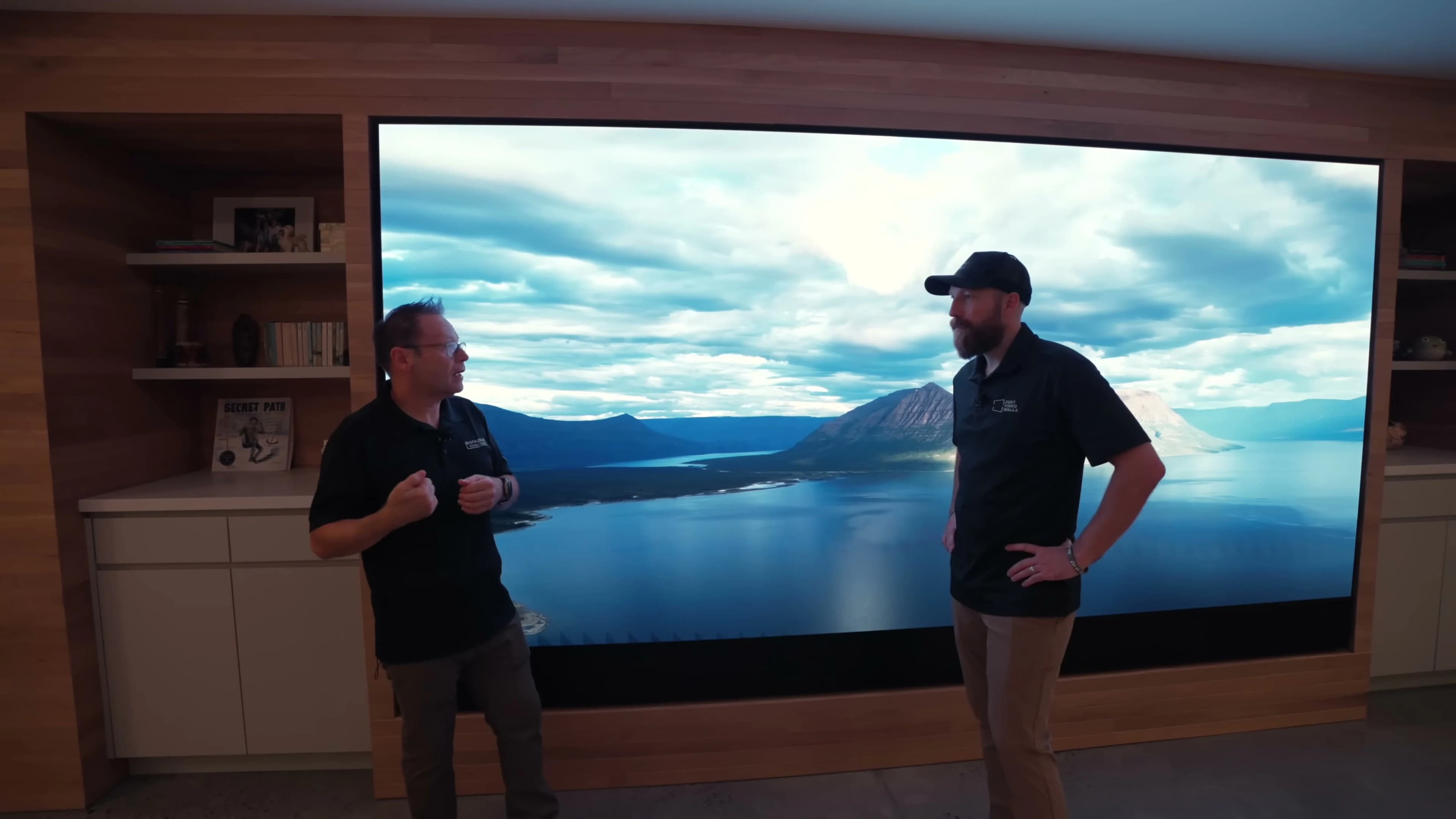 Custom soundbar and seating facing the MicroLED wall