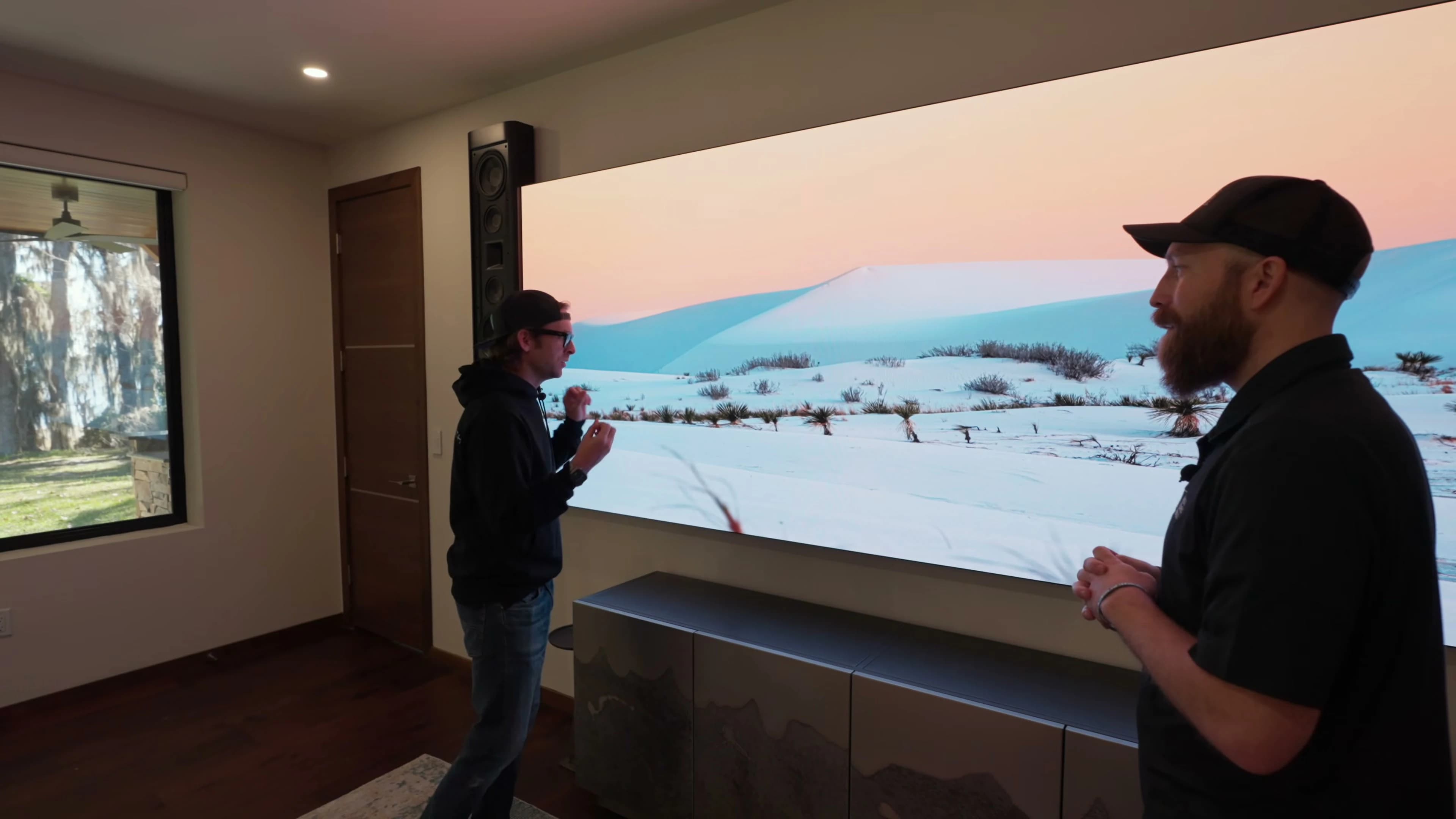 Bar and entertaining layout opposite the MicroLED wall