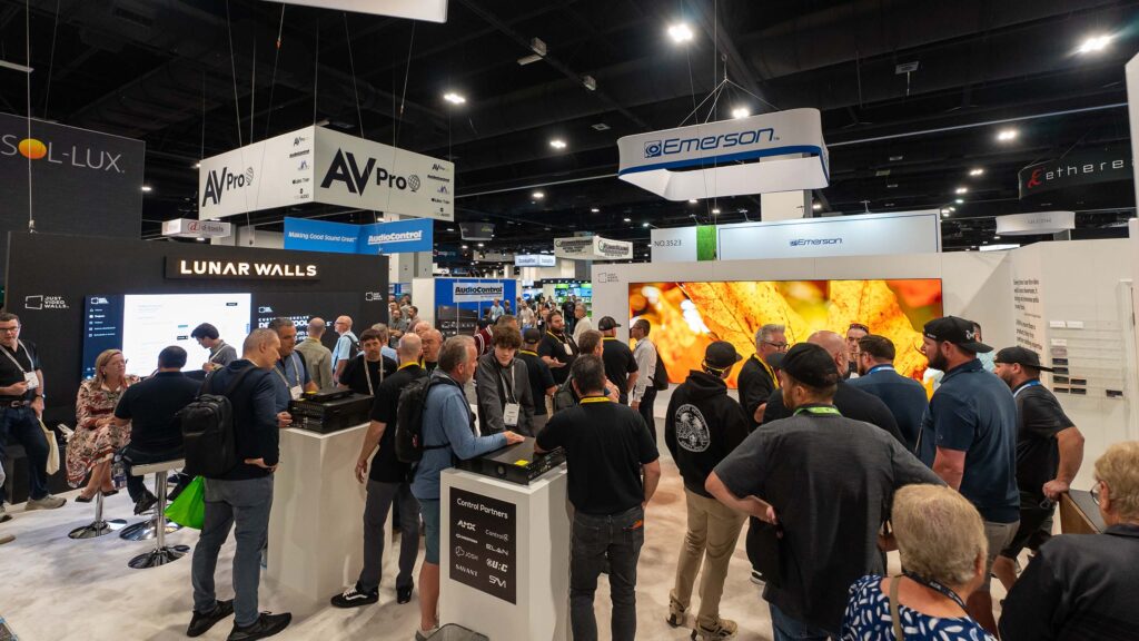 Busy booth at CEDIA 2024 with Just Video Walls